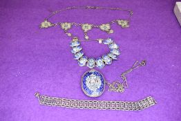 A small selection of white metal jewellery including filligree necklace, Greek key bracelet and