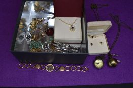 A small selection of costume jewellery including fashion watches, two cased diamante necklaces,