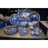 A selection of blue and white wear ceramics including Spode plate and tin glazed water jug all