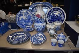 A selection of blue and white wear ceramics including Spode plate and tin glazed water jug all