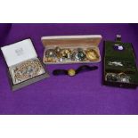 A small selection of costume jewellery including simulated pearls, brooches, wrist watches etc