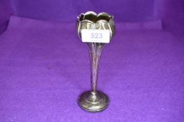 An Edwardian silver bud vase of tulip form having weighted base, Birmingham 1906, Jones & Crompton