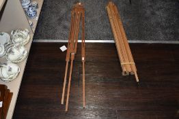 Two wooden easels.