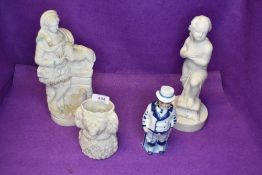 A selection of antique bisque figures including spaniel dog, cherb and nodding head figure