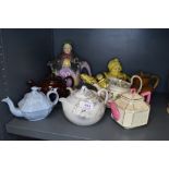 A selection of antique and later teapots various designs including Lingard Sadler and James Powell