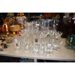 A mixed election of glasses including some whiskey advertising glasses.