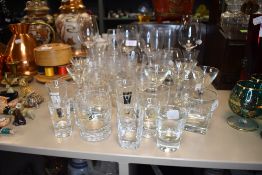 A mixed election of glasses including some whiskey advertising glasses.