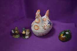 A selection of ceramic birds including Hen egg nest, two mallards and a lidded dish