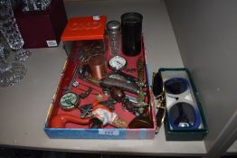 A selection of curios and trinkets including tobacco and desk top items also pocket knives