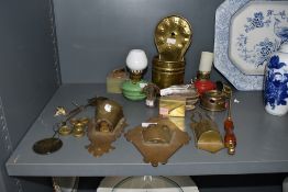 A mixed lot of vintage wall pockets, primitive candle holders and nursery oil lamps with weighted