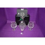 A selection of clear cut crystal glass wares by Waterford including decanter brandy glasses and