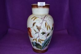 An opal glass vase with hand painted scenes of nature and Wren bird