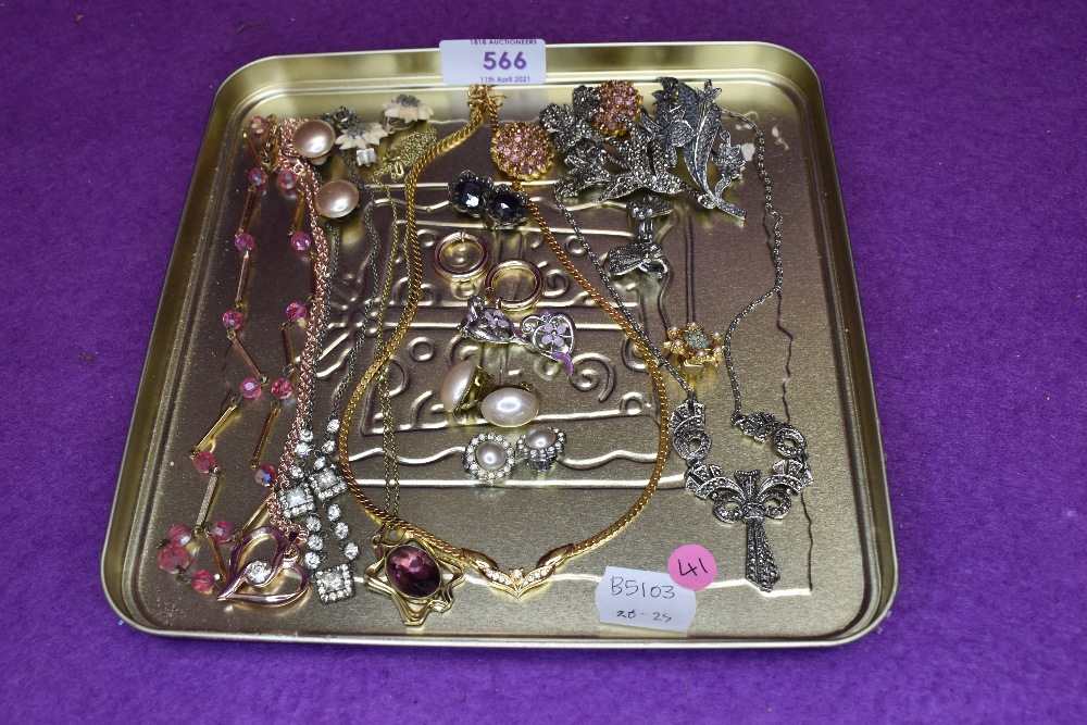 A small tray of necklaces and clip earrings including marcasite, Pierre Cardin etc