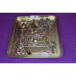 A small tray of necklaces and clip earrings including marcasite, Pierre Cardin etc