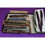 A selection of fountain pens, mainly for parts including Parker 51 in burgundy with a gold cap, a