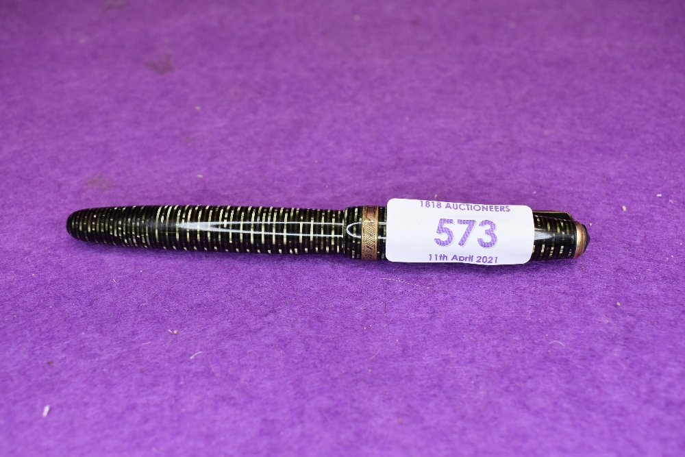 A Parker Vacumatic Major fountain pen green with horizontal pearl rings, and decorative broad band