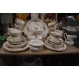 A part tea service, Moss Rose by Royal Albert, including cake plate, tea pot cups and saucers and