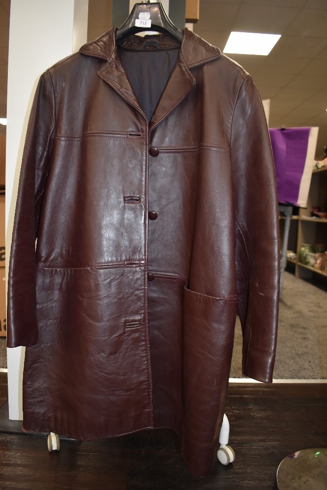A gents vintage leather coat.