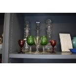 A lot containing three vintage decanters and an assortment of glasses including red and green