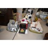 A selection of display items including Lilliput lane and Spaniel dog figure