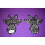 Two Victorian or similar cast lead insurance fire or similar plaques having twin headed bird design