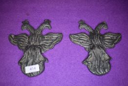 Two Victorian or similar cast lead insurance fire or similar plaques having twin headed bird design