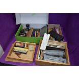 A large selection of writing equipment including dipping pens pencils, mechanical pencils