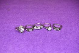 Five lady's silver dress rings having cubic zirconia decoration