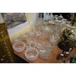 A mixed lot of vintage glass bowls, mugs, vases and more.