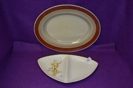 A Carelton ware serving dish and similar Susie Cooper dinner charger