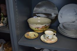 A collection of Royal Doulton amongst which are Niagara falls plate, fruit bowl with cottage and