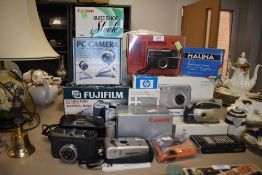 A selection of photographic equipment and similar cameras including boxed Canon Snappy EZ Ferrania