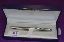 A brushed steel Waterman cartridge fountain pen, made in France
