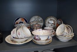 A mixed lot of antique china including tea cups,saucers and bowls.