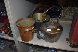 A selection of kitchen or pantry items including jam pan and large stove kettle