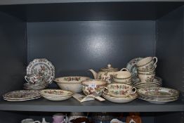 A selection of tea and dinner wares in and Indian tree design mixed names and brands