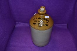 an advertising flagon for S J Garside Uxdridge Ashton U Lyne 1940