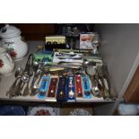 A good selection of serving wares including boxed flatware and cutlery including cruet set