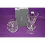 Two clear cut crystal glass vases by Waterford crystal a Marquis vase and similar tall stemmed