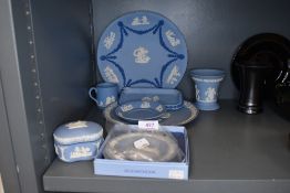 A collection of Wedgwood a couple of items having unusual darker blue and white relief pattern.