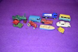 A selection of model toy vehicles by Lesney including boat tractor and van