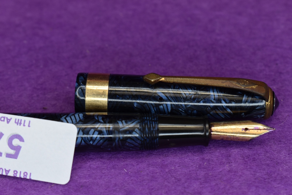 A Conway Stewart 27 leverfill fountain pen in blue marble with broad single gold band to cap - Image 2 of 2