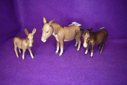 Three Beswick studies, Donkey 2267A, Donkey, second version 1364B and Donkey Foal 2110