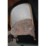 A vintage woven fibre style nursing chair