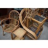 A selection of canework furniture including vintage magazine rack etc