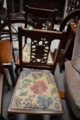 A pair of early 20th Century mahogany bedroom chairs