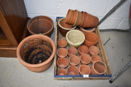 A selection of clay plant pots, various sizes