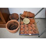 A selection of clay plant pots, various sizes