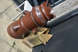 Two salt glazed chimney pots one king style and similar rocket sized queen