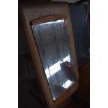 A vintage teak ended dual orientation wall mirror, approx. 79 x 36cm